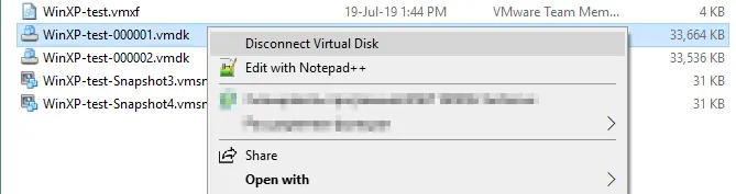 Disconnecting a virtual disk vmdk file from a Windows host OS