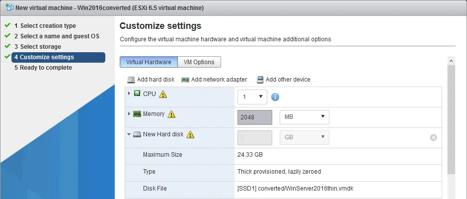 The converted virtual disk is attached to a VM on ESXi.